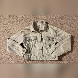 Distressed denim jacket